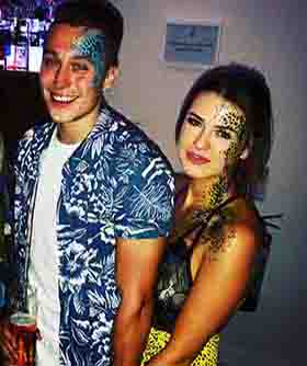two Adults with face painting
