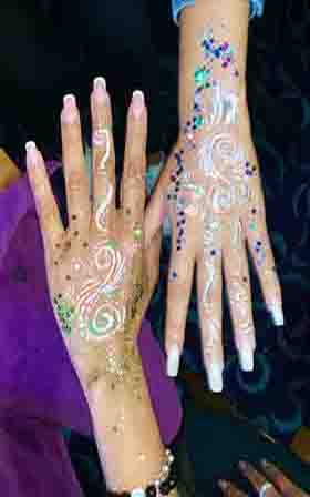 Two arms with painting design on