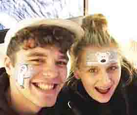Male and Female with faces painted